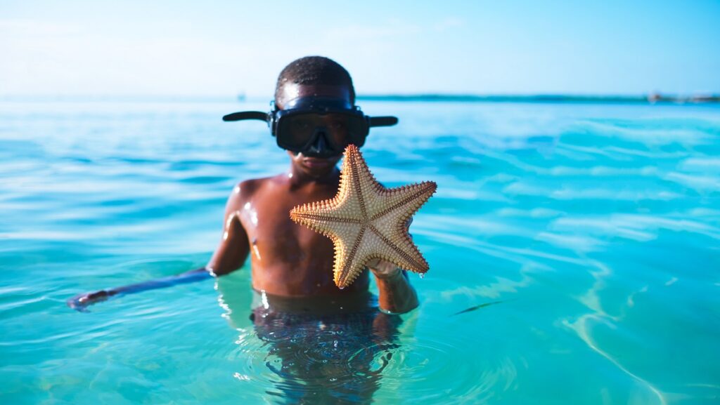 Young lad with a starfish